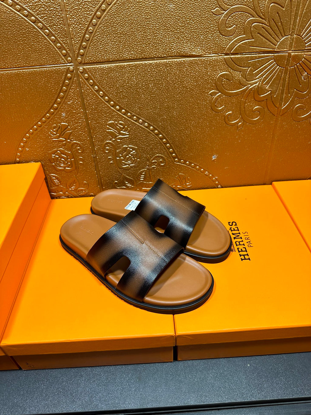Hermes dark blue leather slide sandals with wide strap and cushioned footbed