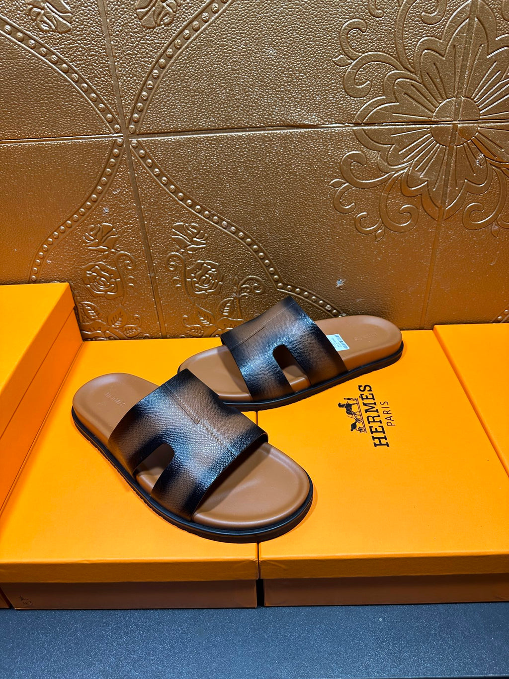 Hermes dark blue leather slide sandals with wide front strap and flat sole