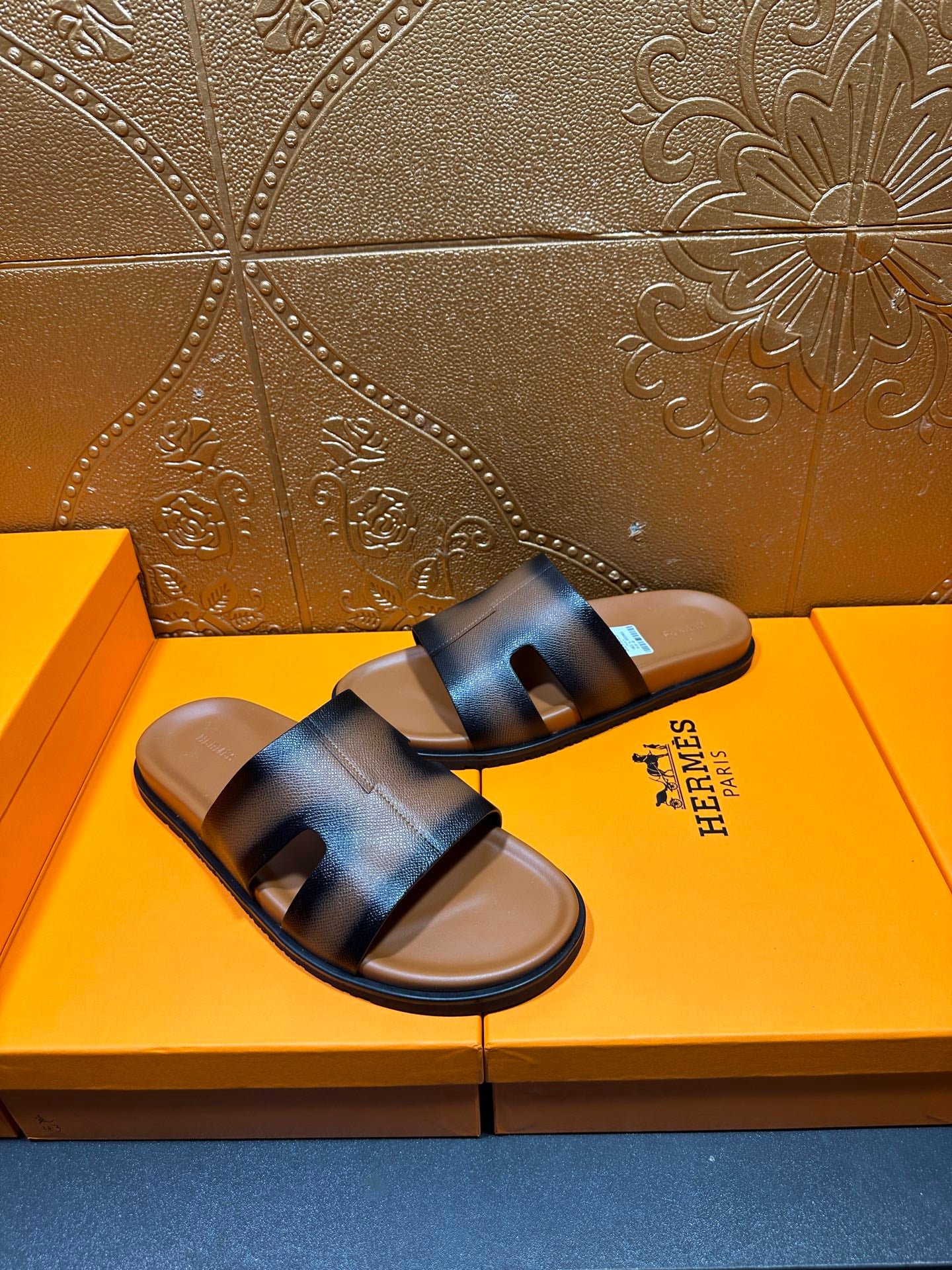 Hermes dark blue leather slide sandals with wide front strap and flat sole
