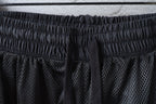 Black elastic waistband with perforated mesh-style panel detailing