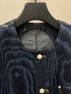 Blue denim jacket collar and front placket with metal snap buttons