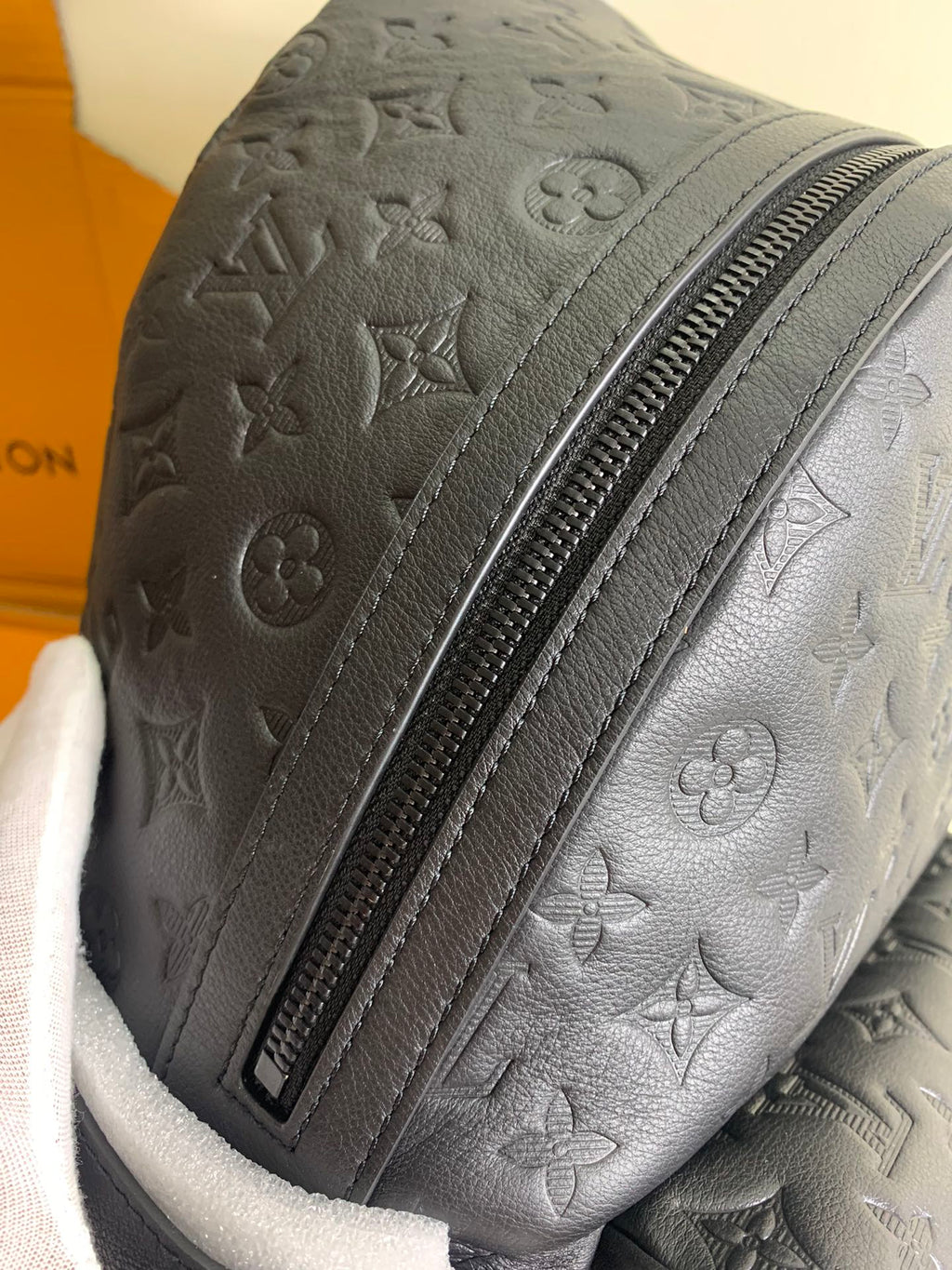 Louis Vuitton bag embossed monogram leather with front zipper and trim