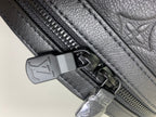 Louis Vuitton bag zipper pull with leather tab and silver metal hardware