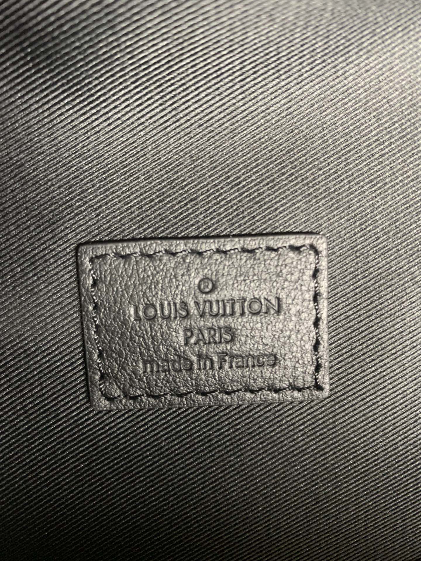 Louis Vuitton bag leather label patch with Louis Vuitton PARIS text