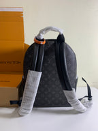 Monogram backpack with wide front panel and black top handles