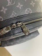 Louis Vuitton bag zipper pull with gold-tone hardware