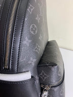 Louis Vuitton bag side pocket with zipper and textured leather panel