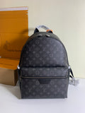 Monogram backpack with front zip pocket and adjustable shoulder straps