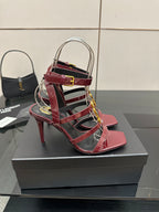 Red patent open-toe strappy sandals with gold YSL buckle and stiletto heel