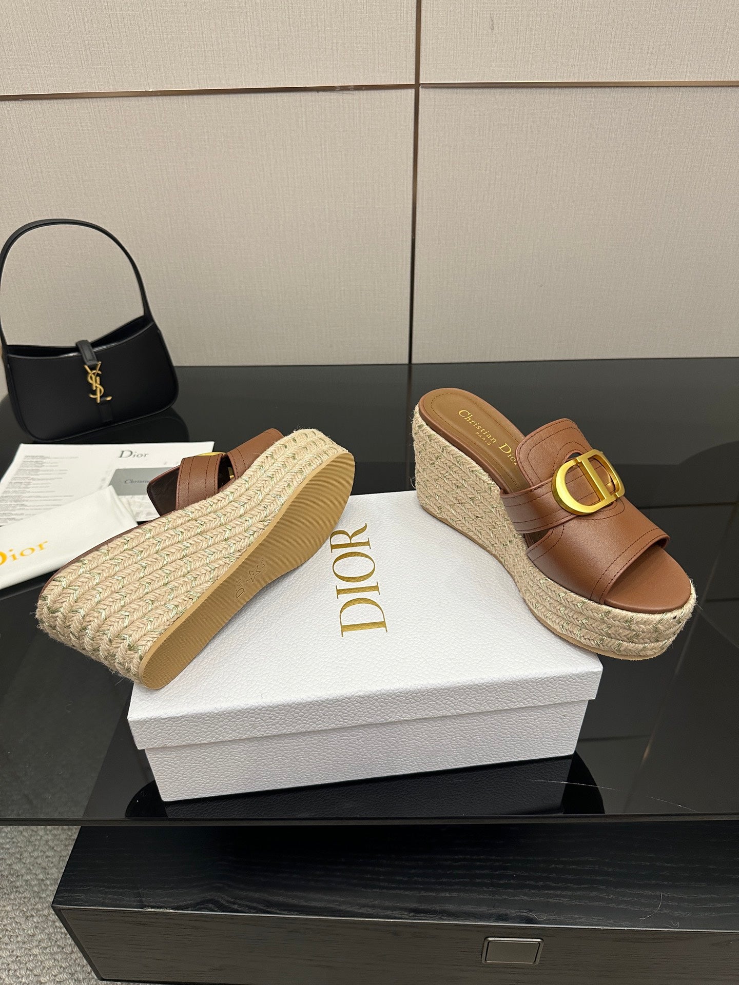 Brown leather espadrille wedge slide sandals with gold D buckle and textured platform