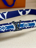 Blue and white monogram belt with oversized gold buckle
