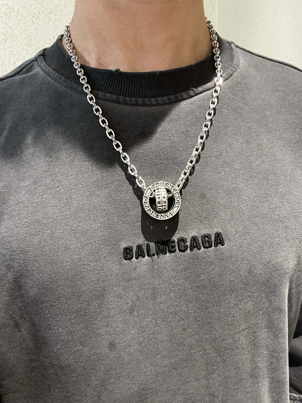 Silver-tone chain necklace with round Balenciaga monogram pendant
