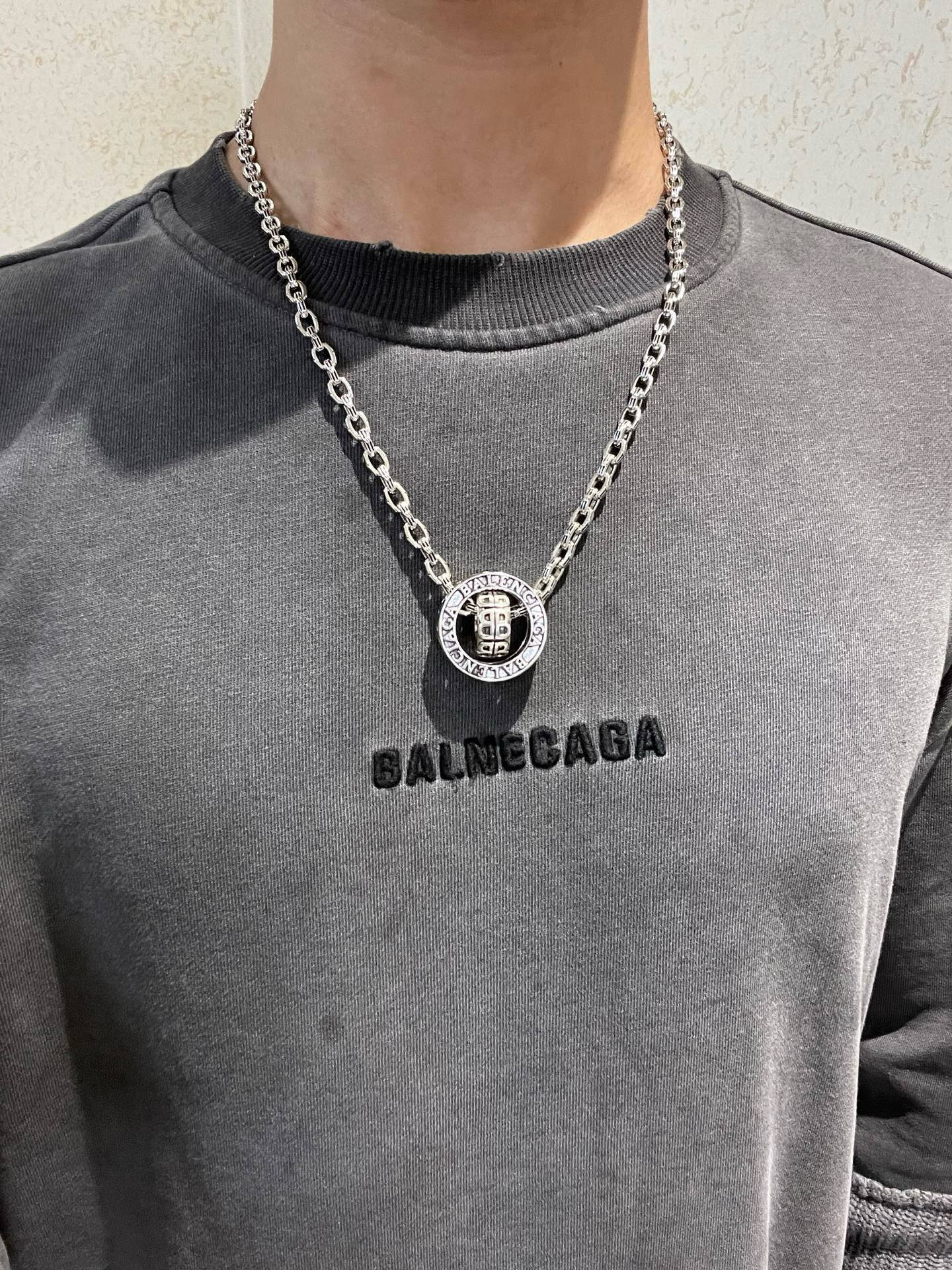 Silver-tone chain necklace with round Balenciaga monogram pendant