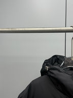 Prada black hooded puffer coat with attached hood and metal logo hardware
