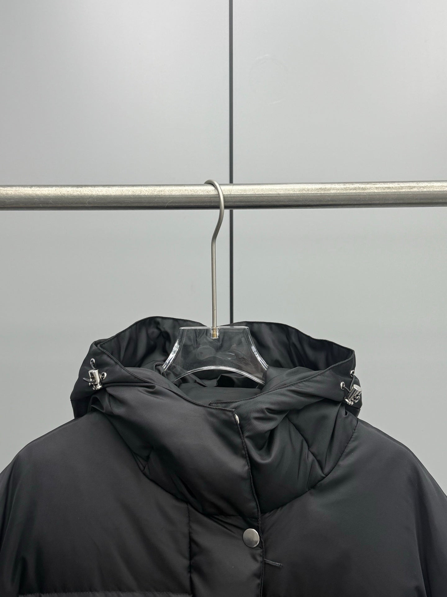 Prada black hooded puffer coat, button front with snap detail at the collar