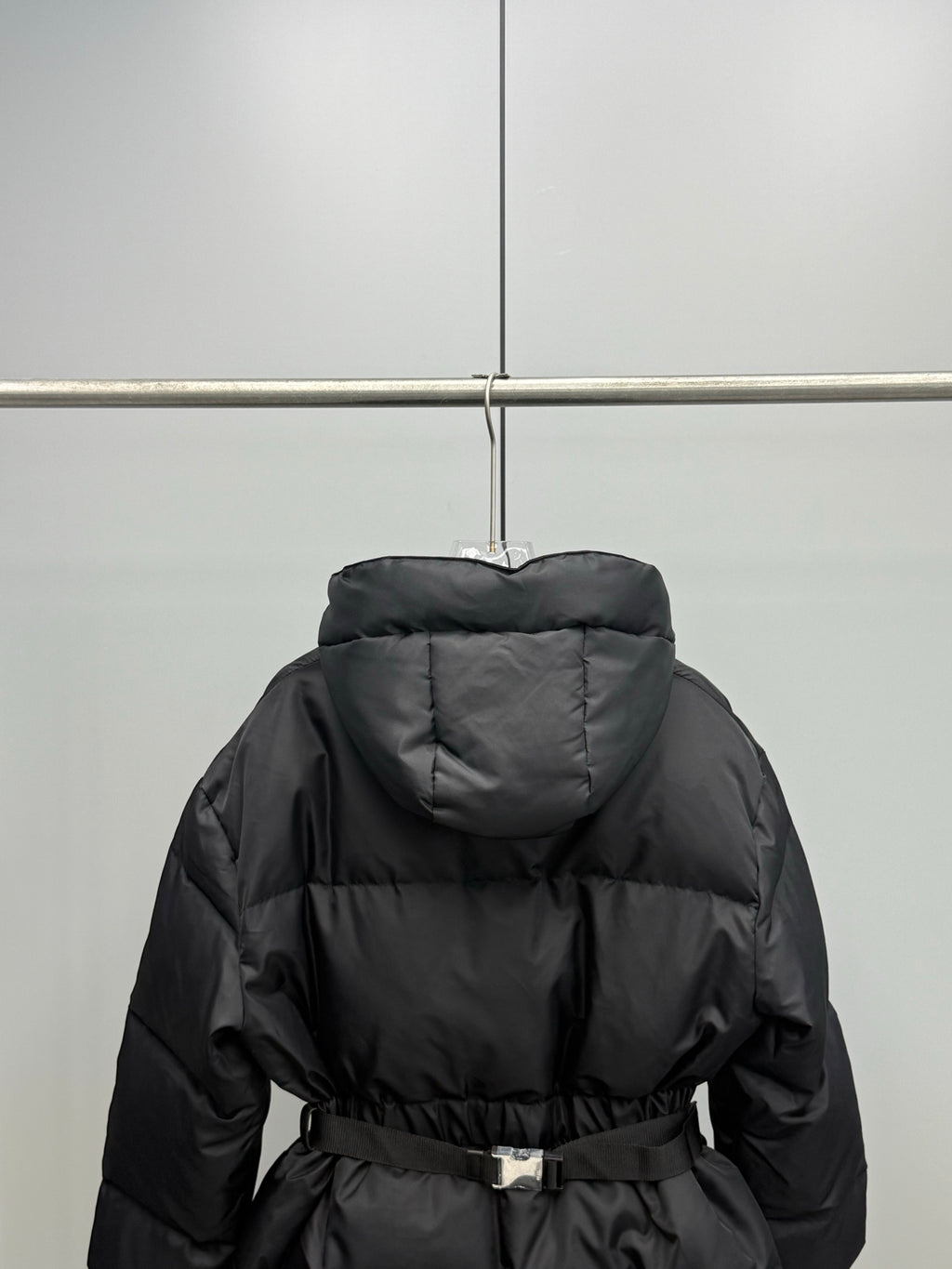 Prada black hooded puffer coat with belt, quilted back view