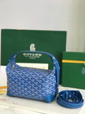 Blue Goyard-pattern hobo bag with top handle, gold zipper, leather trim.