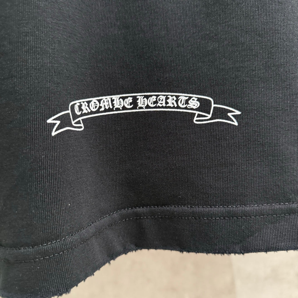 Black long-sleeve sweatshirt close-up of white ribbon logo text