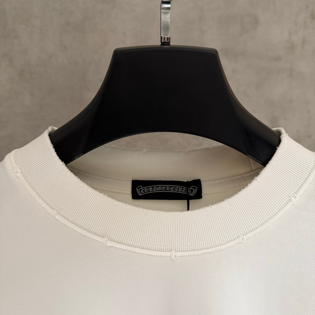 White crewneck long-sleeve shirt collar with interior label