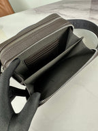 Fendi crossbody bag open interior with dark lining and silver zipper along the top edge.