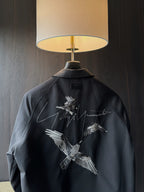 Amiri dark button-up shirt back view with bird embroidery and signature