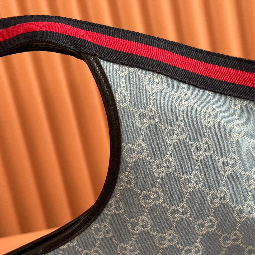 Gucci tote bag top strap edge with black trim and red stripe