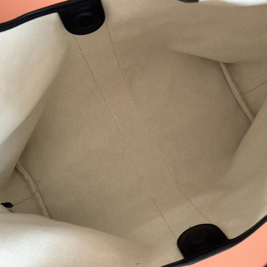 Gucci tote bag interior lining with stitched seams and fabric pocket tabs