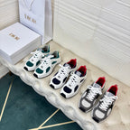 Unisex sneakers set of three pairs: white/green and gray/black with red accents