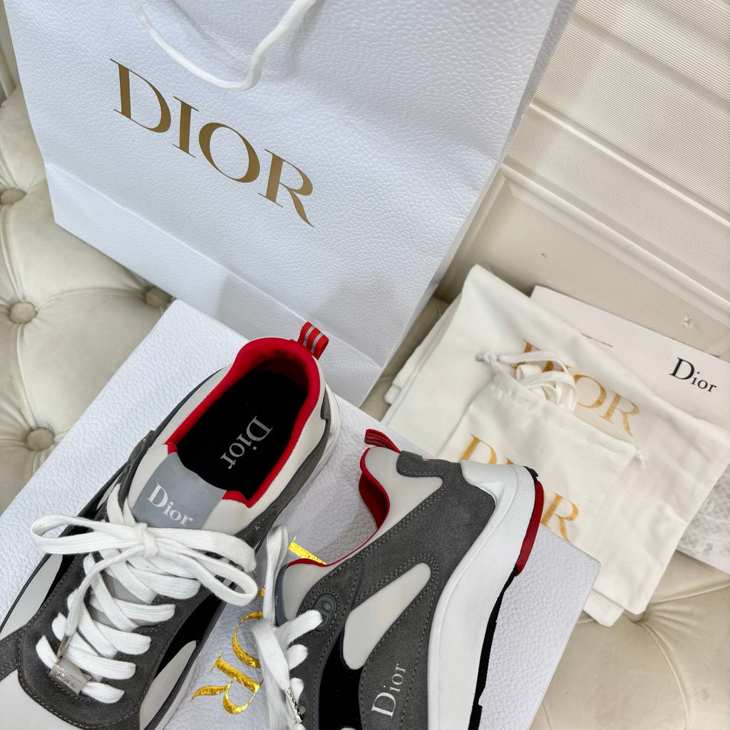 Unisex sneakers, gray and black with white panels, red inner heel, white laces