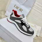 Unisex sneakers, gray and black with white panels, red-lined collar, white laces