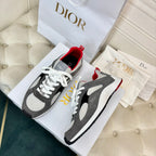 Unisex sneakers pair, gray and black with white panels, red accents, white laces