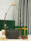 Monogram shoulder bag with tan leather trim, top handles, and crossbody strap