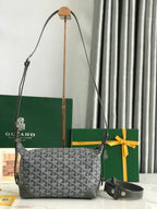 Goyard bag in dark gray monogram canvas with top handles and crossbody strap
