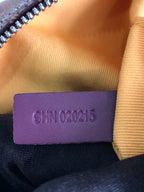 Leather size or code tag reading “CIN 022215” inside handbag