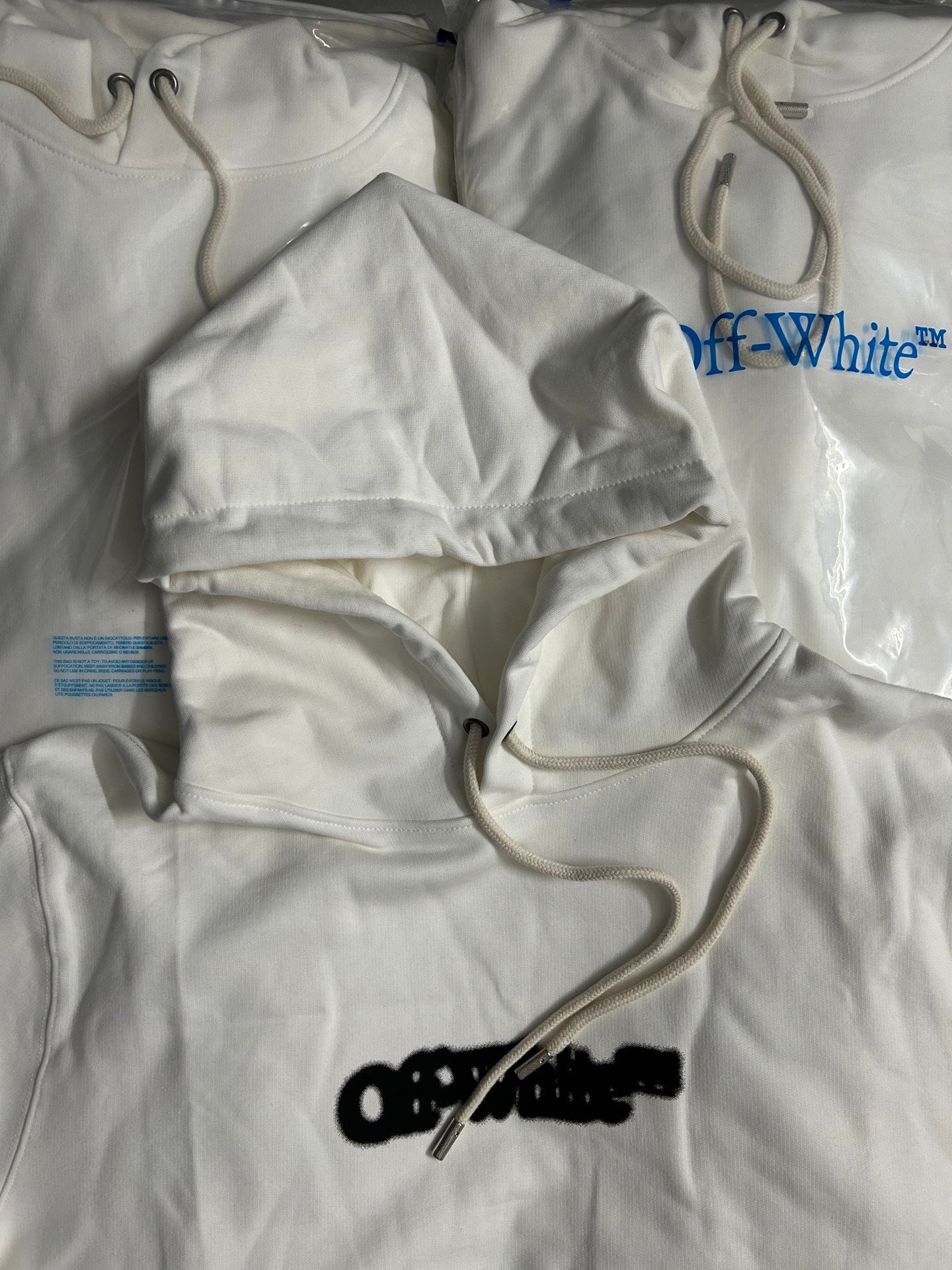 Off-White off-white hoodie sweatshirt with black graphic print and drawstring hood