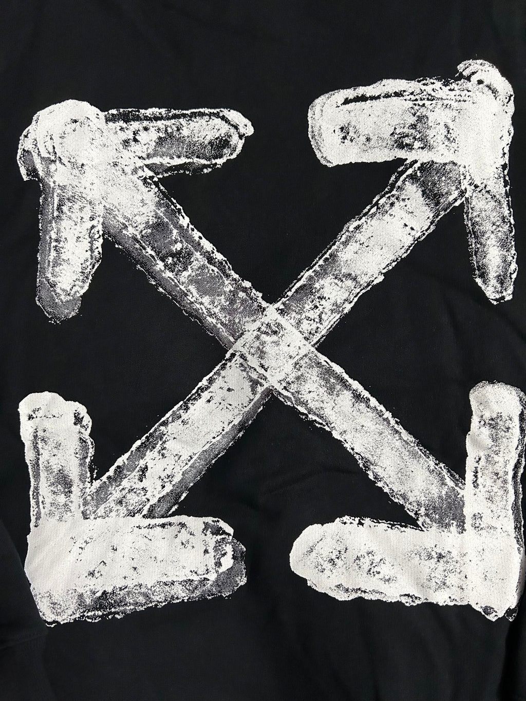 Black hoodie with large white arrow logo graphic