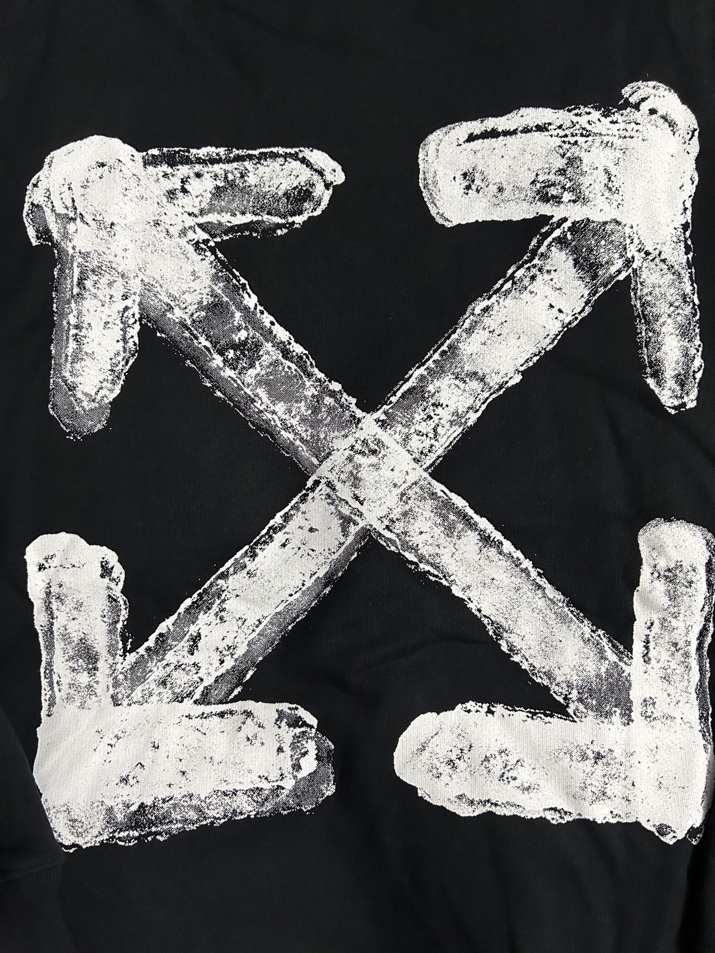 Black hoodie with large white arrow logo graphic