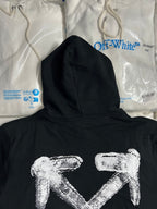 Black hoodie with large white arrow logo and hooded neckline
