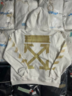 Off-White hooded sweatshirt front view with large gold arrow-style emblem
