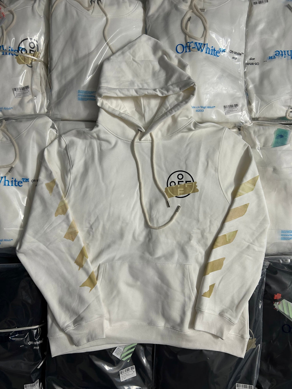 Off-White hooded sweatshirt, off-white base with gold graphic print and drawstring hood