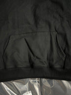 Off-White black hoodie hem area with kangaroo pocket seam