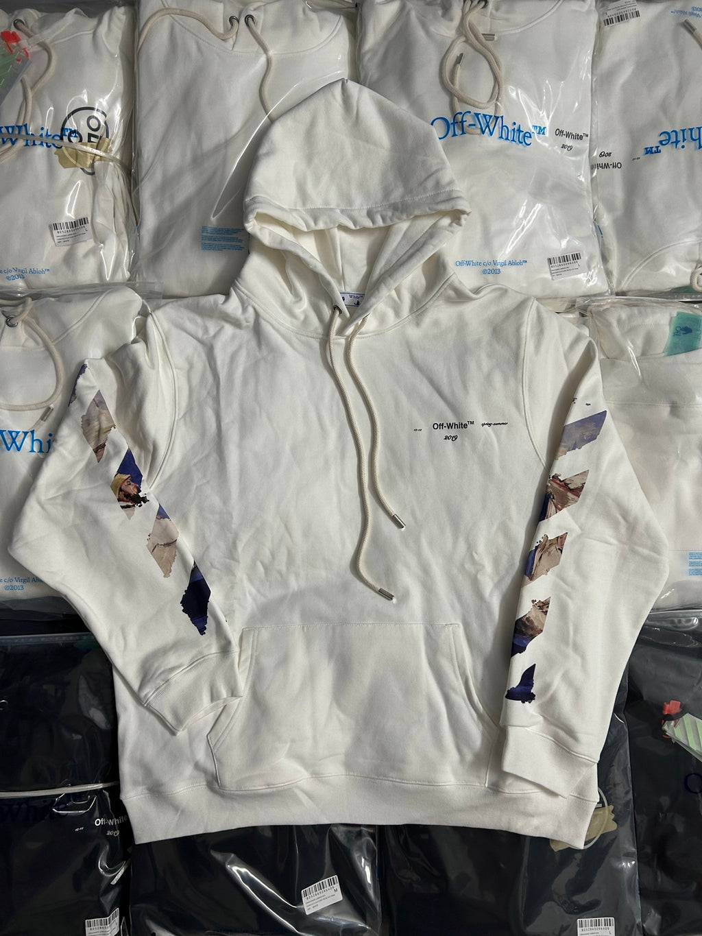 Off-White white hoodie with front kangaroo pocket and abstract blue graphic sleeves