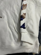 Off-White white hoodie sleeve with blue graphic print and ribbed cuff