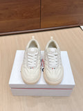 Moncler low-top sneakers, white leather lace-up, side logo patch, gum rubber sole