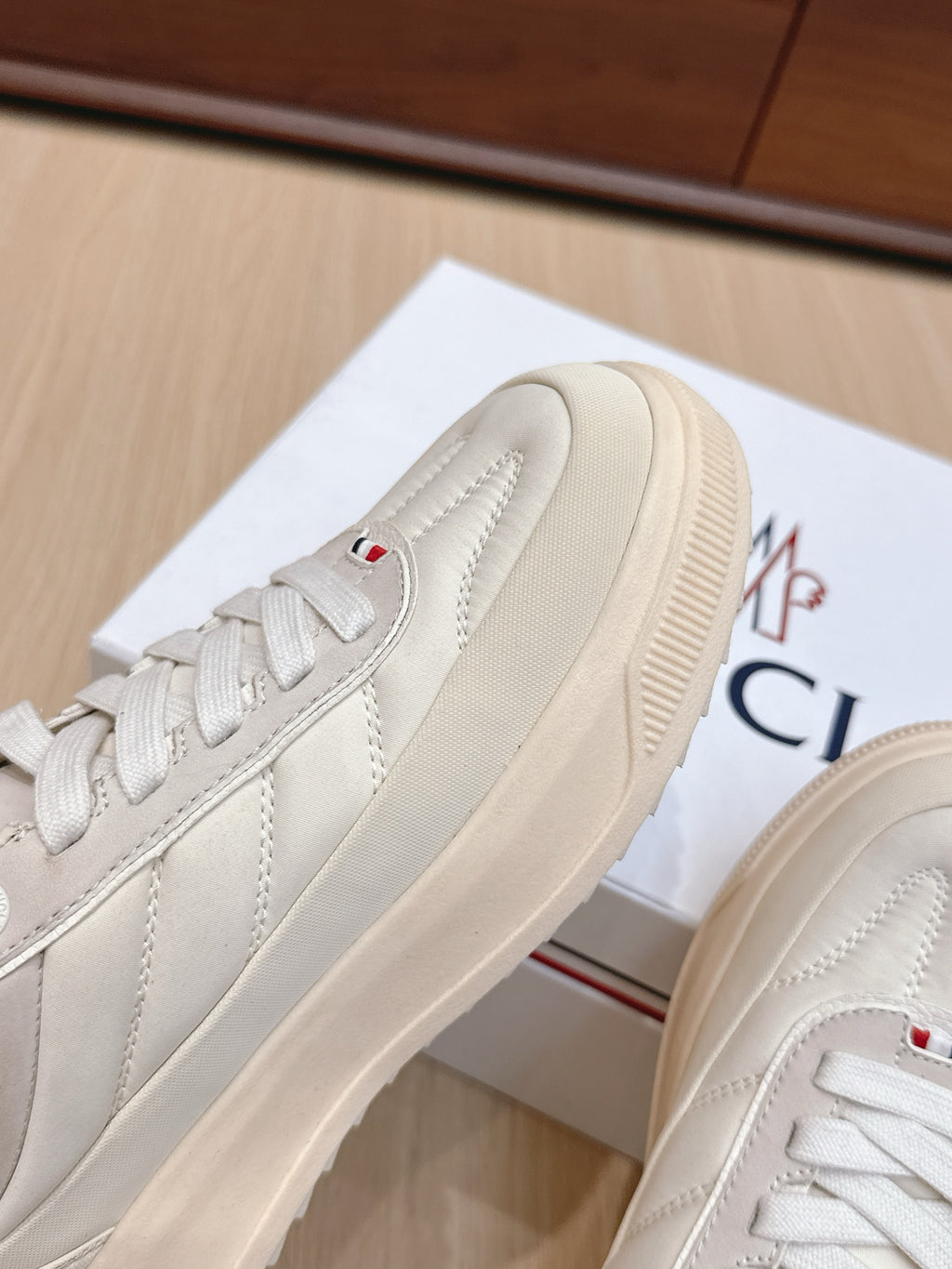 Moncler sneakers, white leather toe and side panels with stitched seams and logo trim