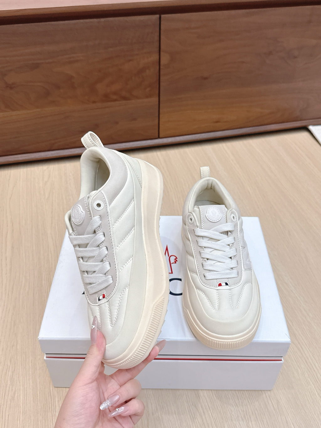 Moncler low-top sneakers, white lace-up with side logo, contrast stitching, gum sole