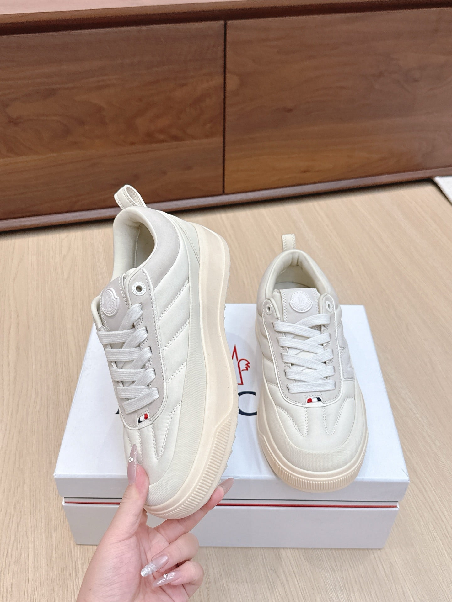 Moncler low-top sneakers, white lace-up with side logo, contrast stitching, gum sole