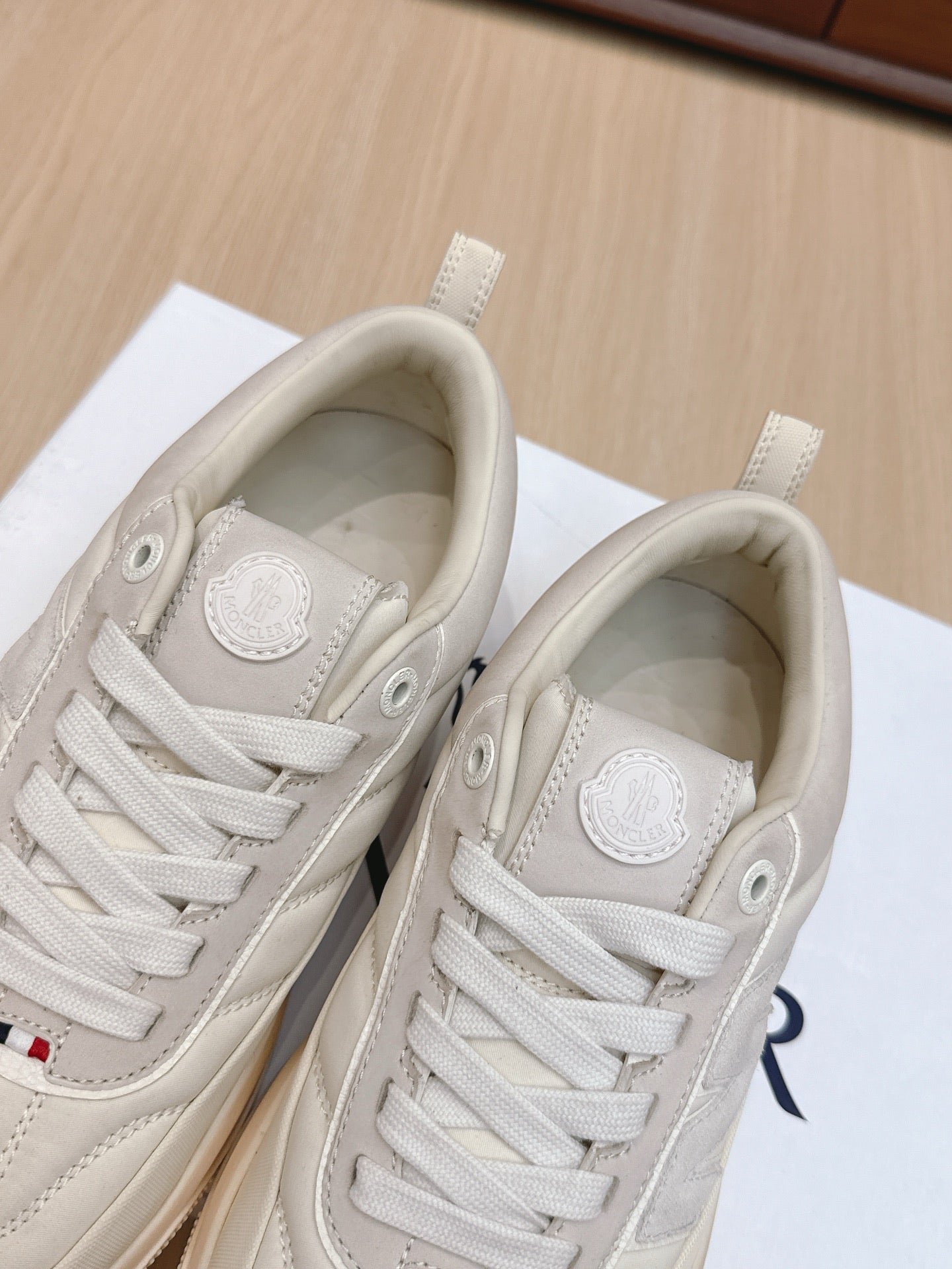 Moncler sneakers, white lace-up with circular logo patch on tongue and padded collar