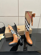 Burberry check ankle boots with tan leather, bow at cuff, sculpted block heel
