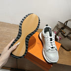 Hermes unisex sneakers outsole view, textured rubber tread on thick sole.